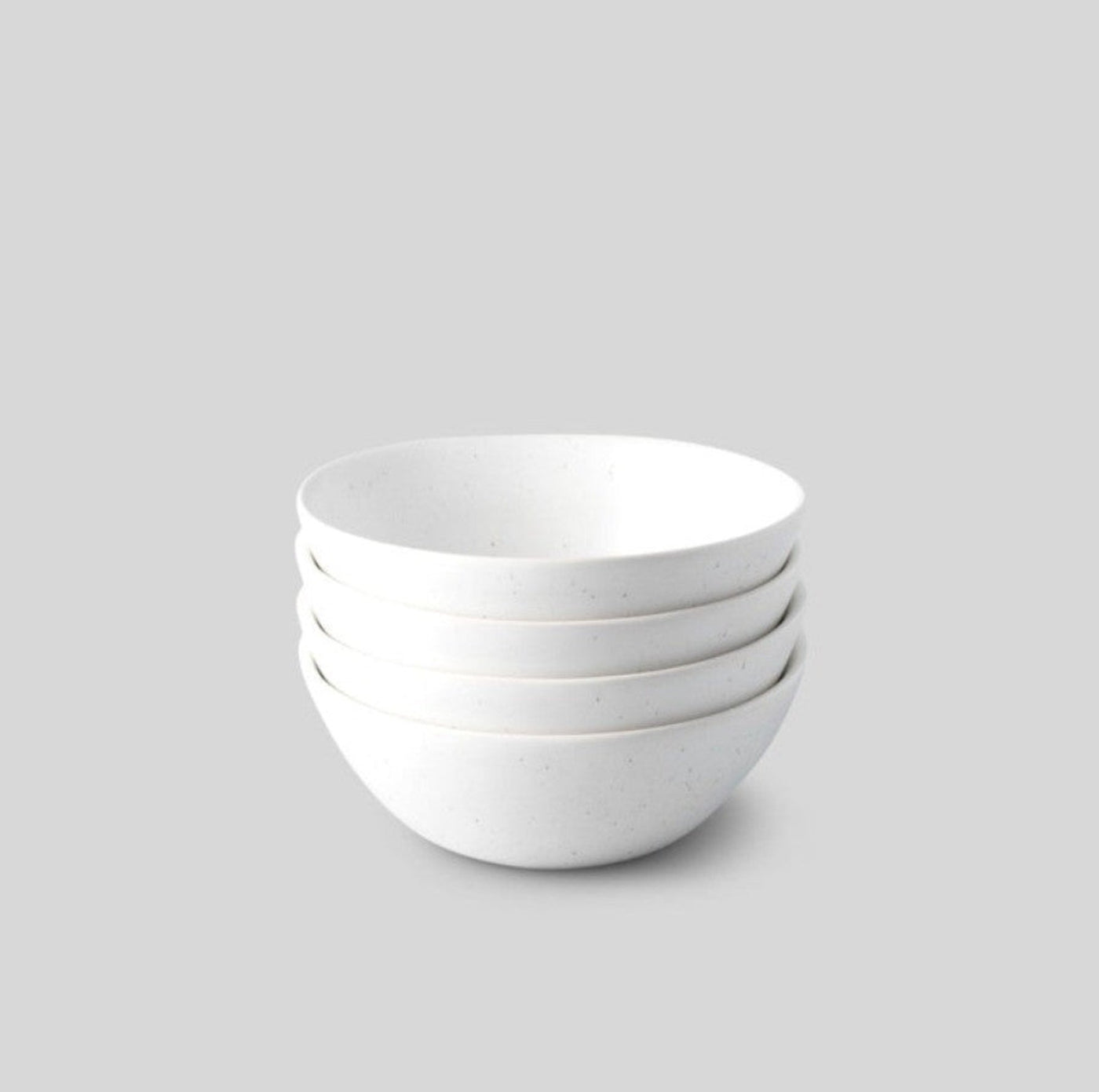 4 piece stoneware bowls · Size: 6.5" dia x 2.25" H / 1.1 lb each. Holds 20 oz · Use at breakfast, or for soup or dessert · Organic-shaped speckled white - #832960000444