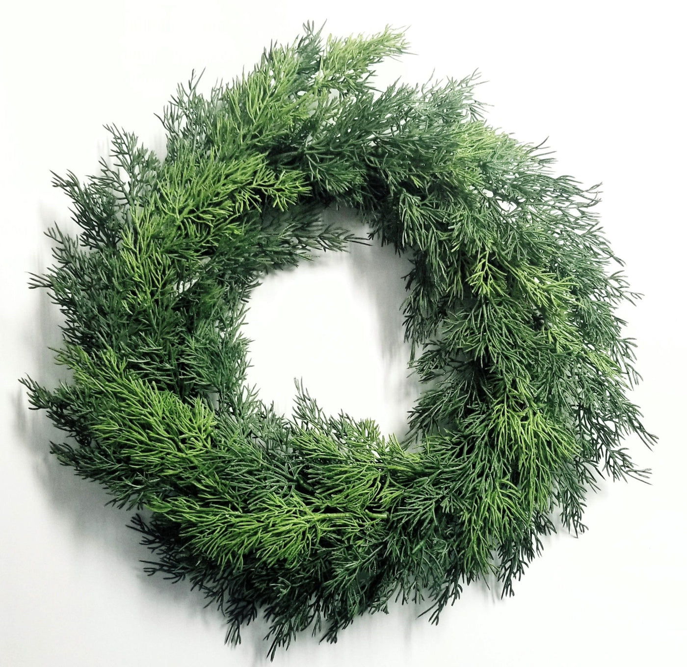 Fresh Touch Cedar Wreath 20": Faux greenery. Add to walls, doors and spaces in need of some holiday cheer
