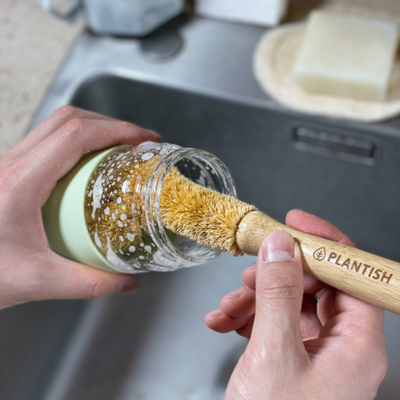 Coconut Brush - For dishes, bottles, and glasses in the home.  Brand: Plantish Future