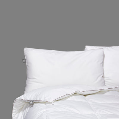 Down Alternative Microfiber Duvet Insert on bed with pillow