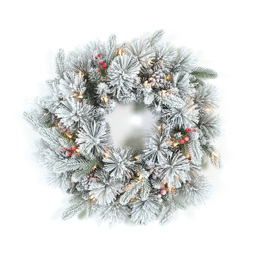 Flocked Christmas wreath with lights: adds holiday cheer to your home. Hang it on doors, mantels, and walls. Easy to shape and fluff. FAUX w  pinecones and red berries. Lights included.