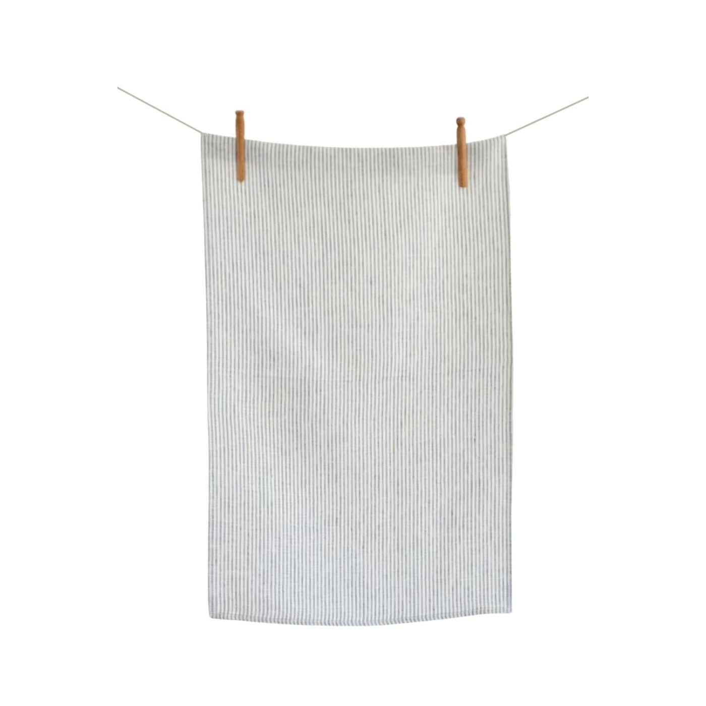 French striped linen tea towel Hanging on clothes line.