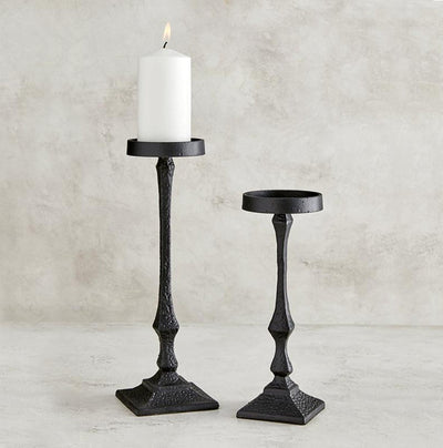 Hammered Metal Candle Holders on a table, adding rustic charm and farmhouse style to modern home décor.