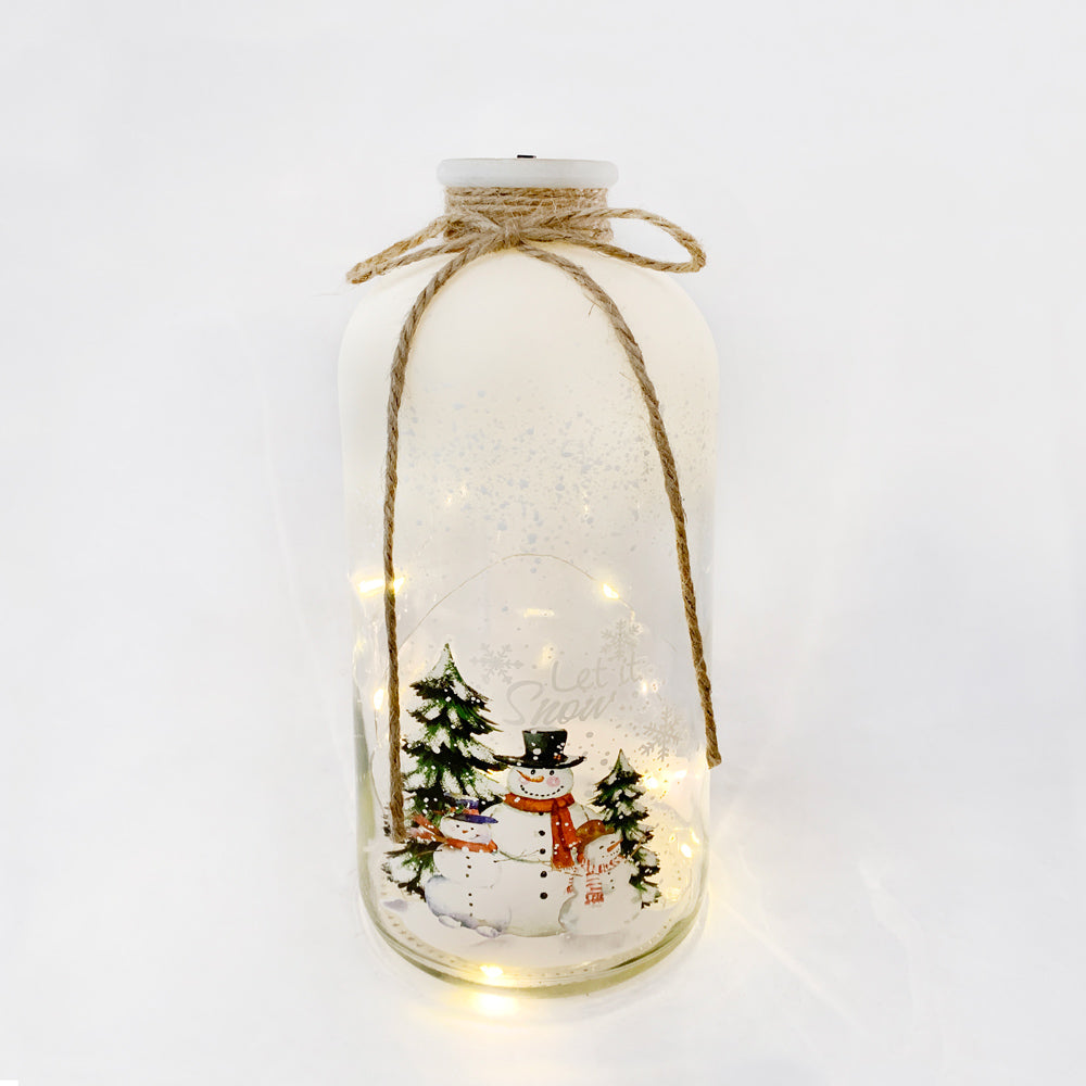 Light-up snowman LED Christmas bottle creating cozy festive ambiance
