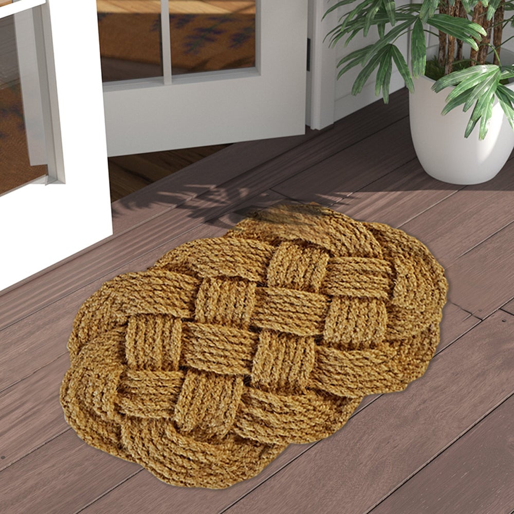 Lovers Knot Doormat on patio by door and plant