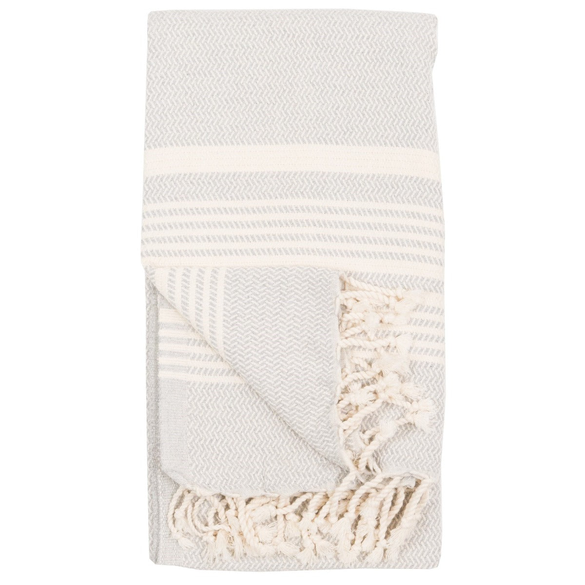 Mist-Colored, Hasir Turkish Bath Towel: it has micro-herringbone pattern, hand-spun tassels, a neutral hue for a calm coastal colour story.