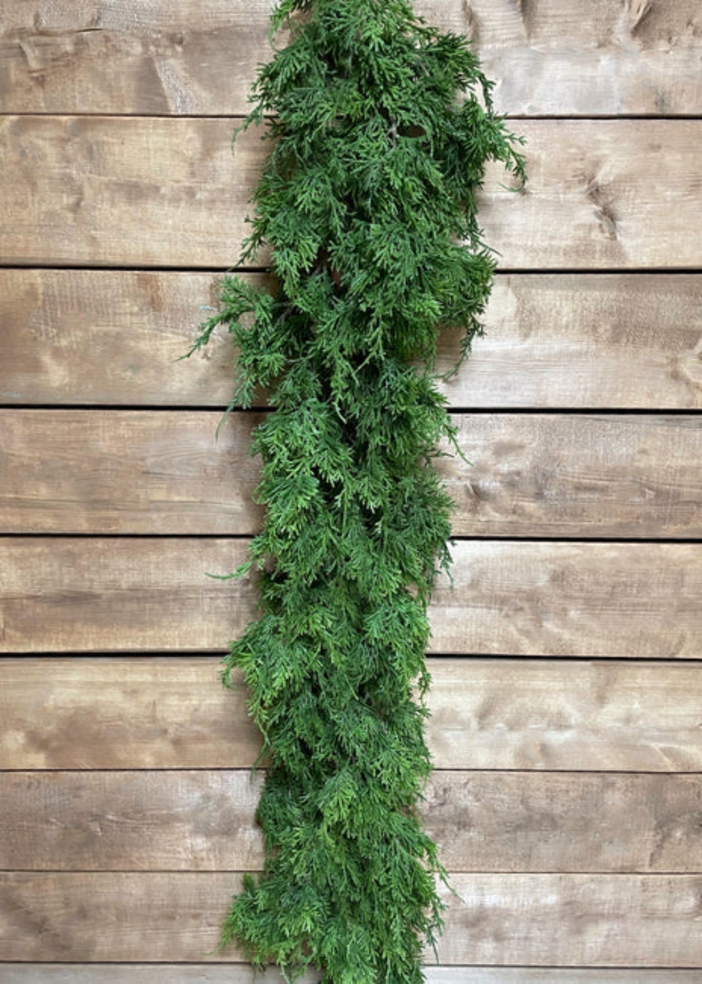 This gorgeous 68" Fresh Touch Northern White Cedar Garland -  is perfect to add a touch of elegance to your home, or any event. 