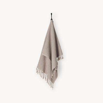 Hanging waffle hand towel in stonewashed clay color