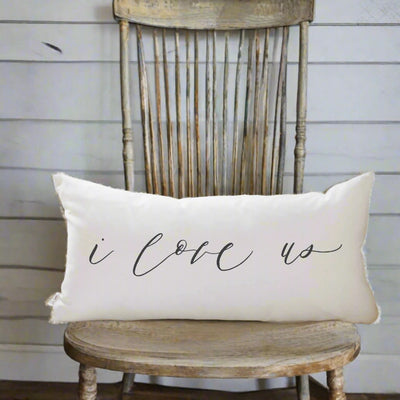 I Love Us Throw Pillow on Farmhouse chair