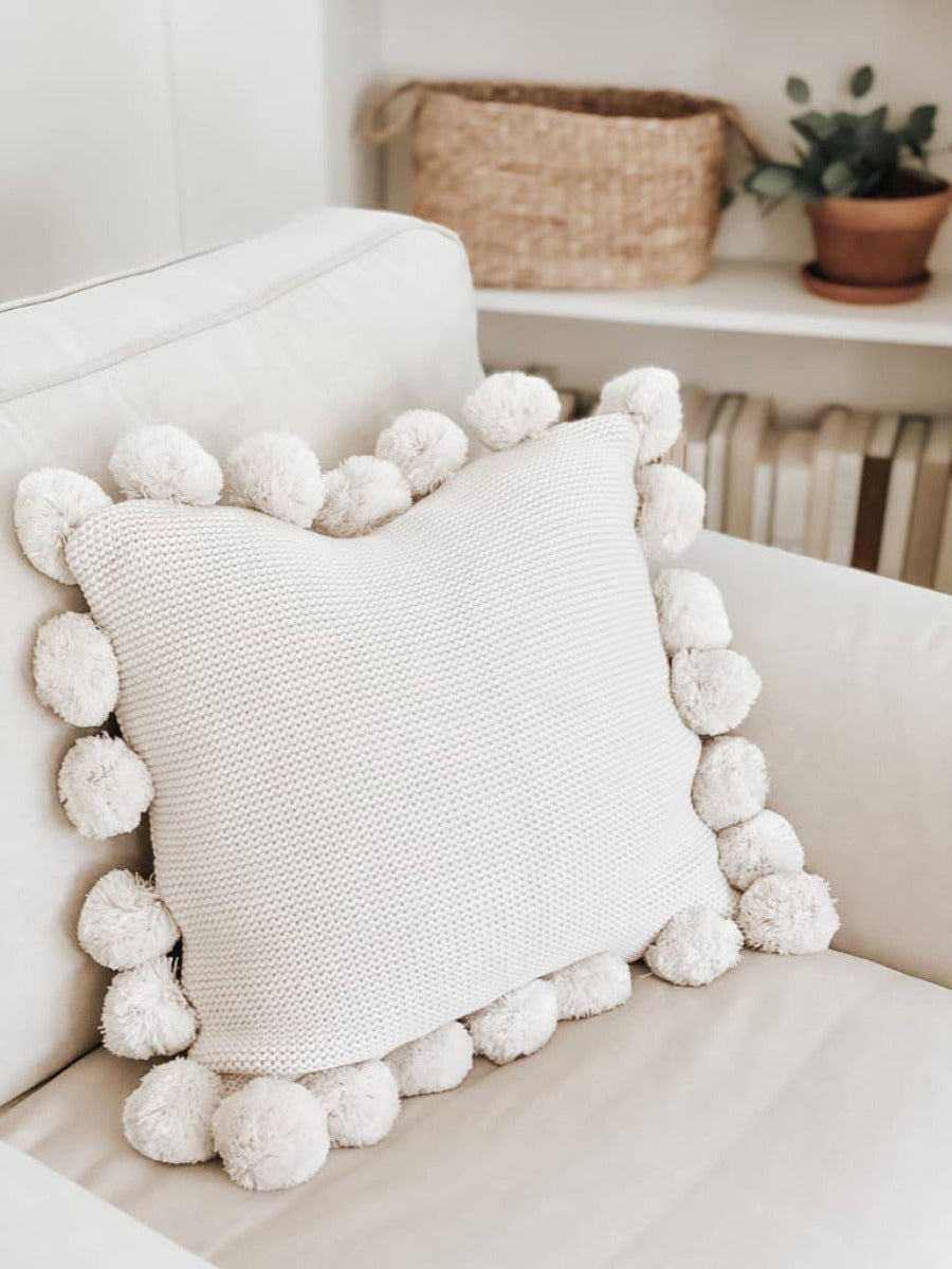 Knit Pillow With Pom Poms