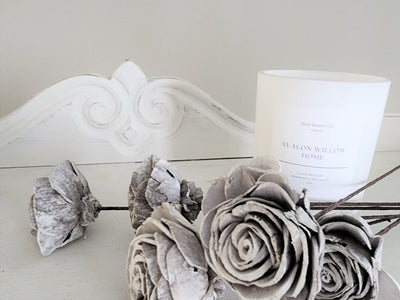 Sola Whitewash Roses: come in a bundle of 6. Size: 2.5" diameter. On table with candle