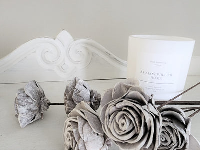 Sola Whitewash Roses, come in a bundle of 6. Size: 2.5" diameter. On table with candle