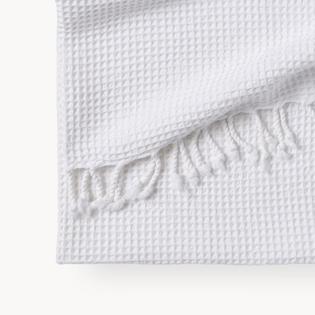 stonewashed waffle towel with tassles.  Salt color TTSW2