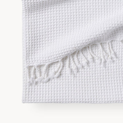 stonewashed waffle towel with tassles.  Salt color TTSW2