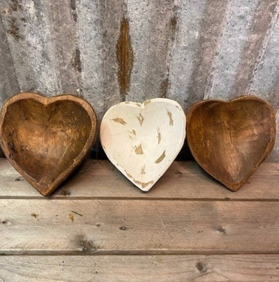 distressed white wooden bowl and 2 Natural heart dough bowls on table