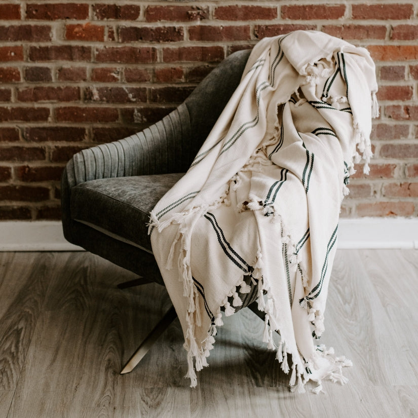 Kate Turkish Cotton Throw Blanket on Grey Chair